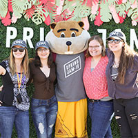 Image of attendees taking a picture with Goldy Gopher.