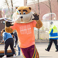 Image of Goldy blowing bubbles.